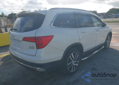 2017 Honda Pilot Elite z USA, uszkodzony, nr VIN 5FNYF6H04HB031645
